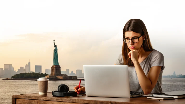 A female student with glasses working on a laptop at a desk with the Statue of Liberty and New York City skyline in the background, featuring an abstract AI-inspired wave graphic.
